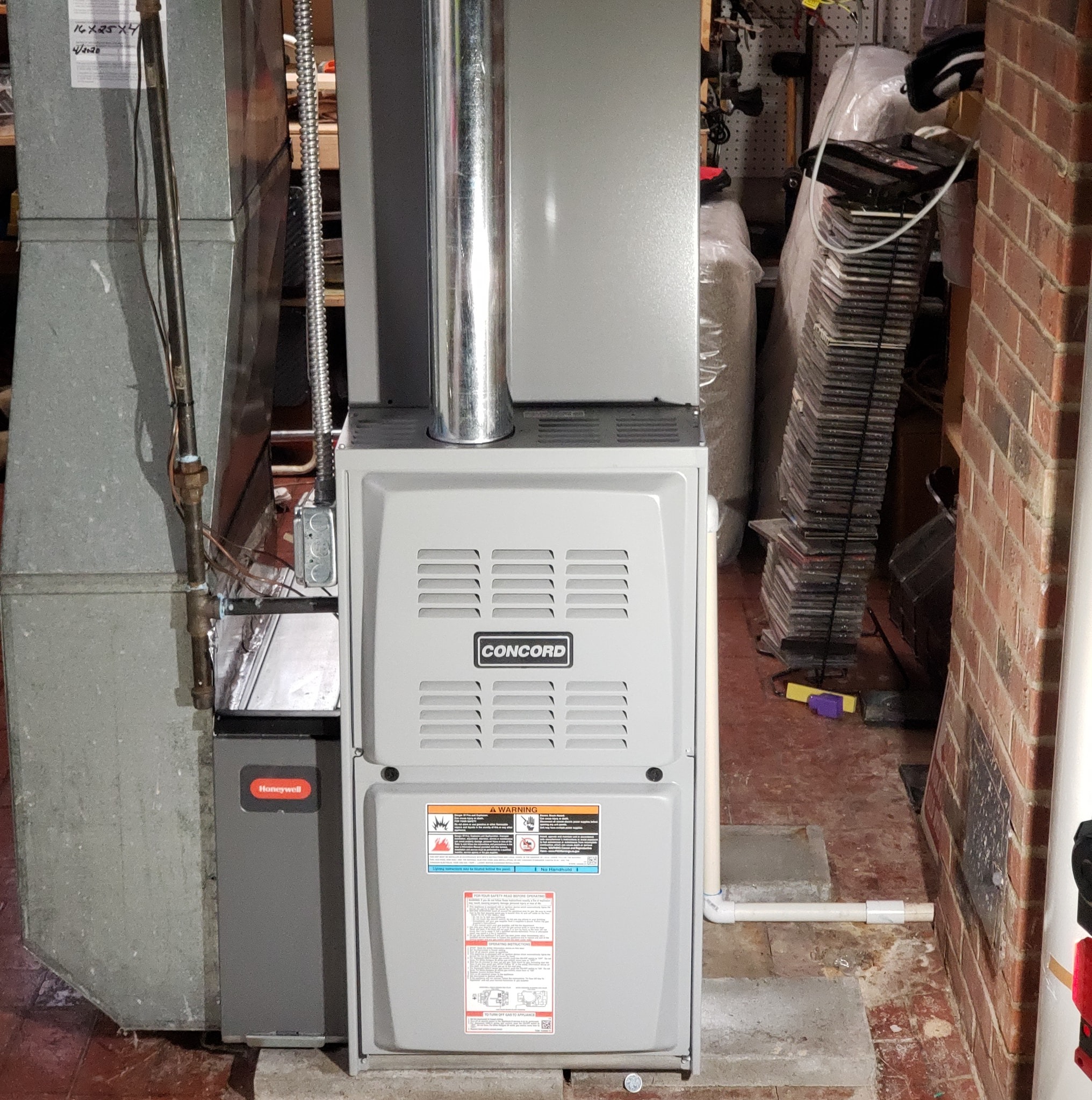 HVAC technician servicing a furnace unit