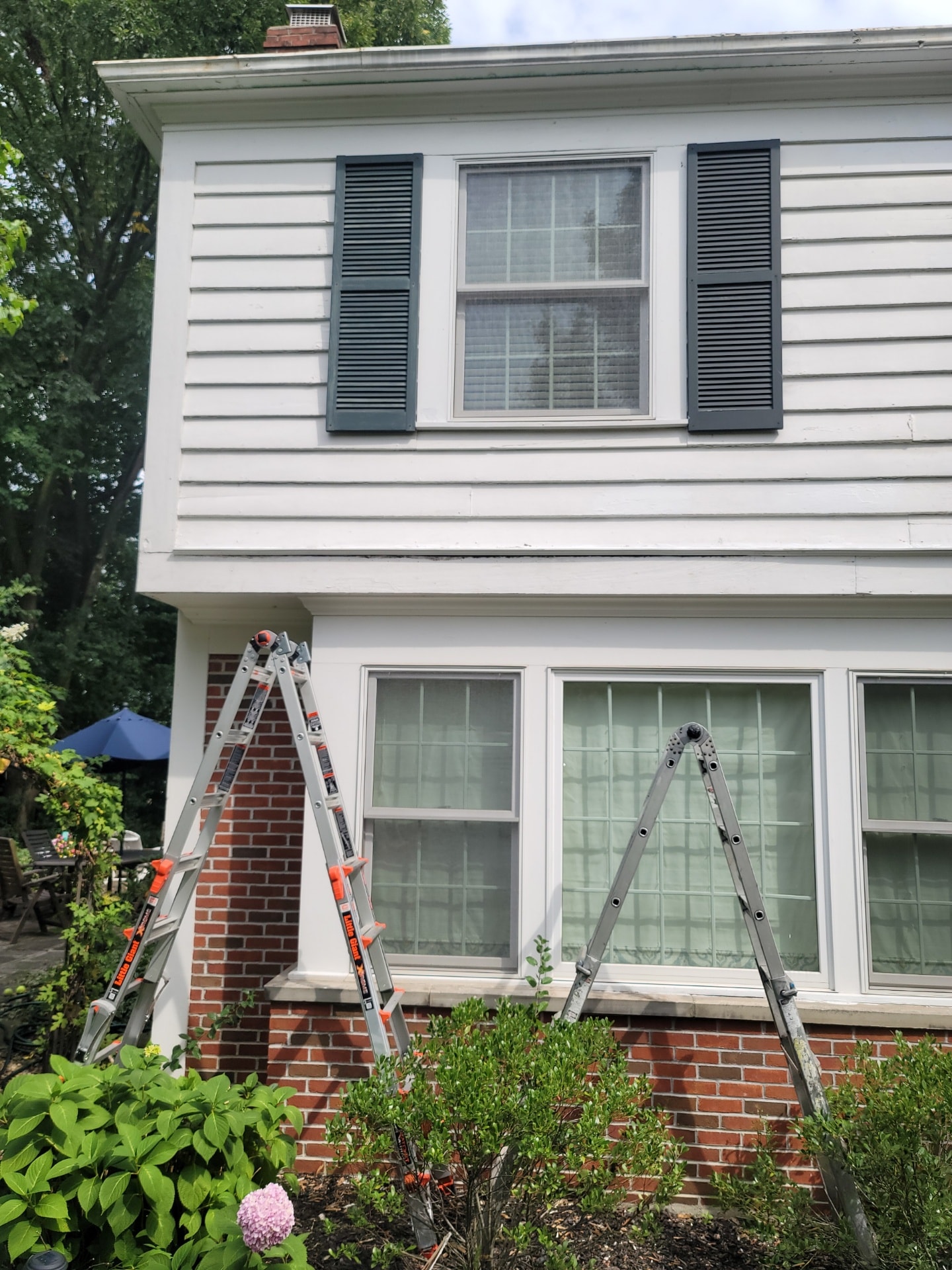 Technician repairing a home window